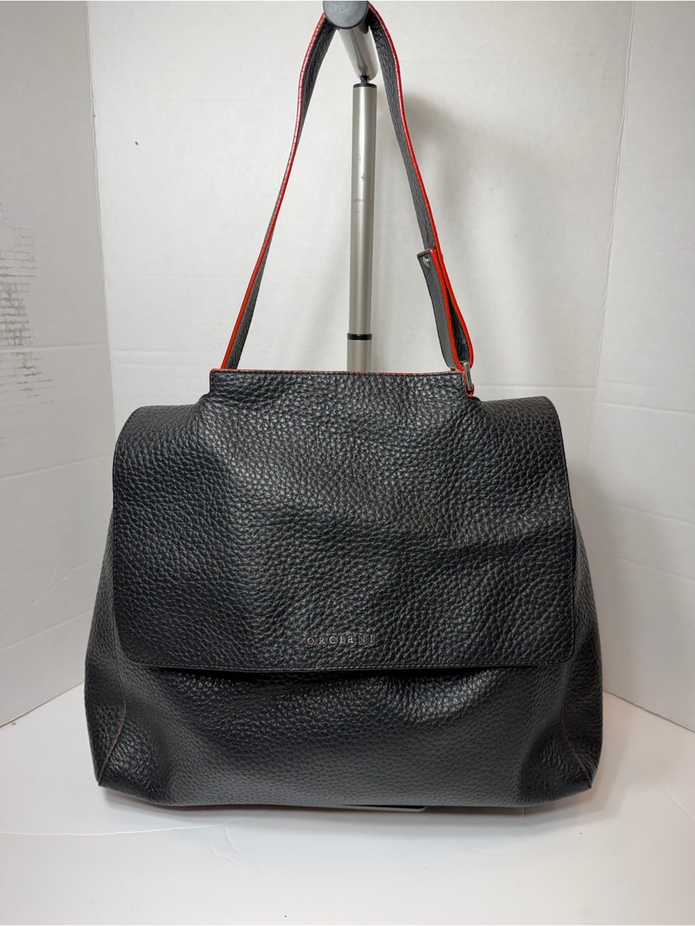 ORCIANI Black Textured Leather Shoulder Bag with Red-Trim Strap $750